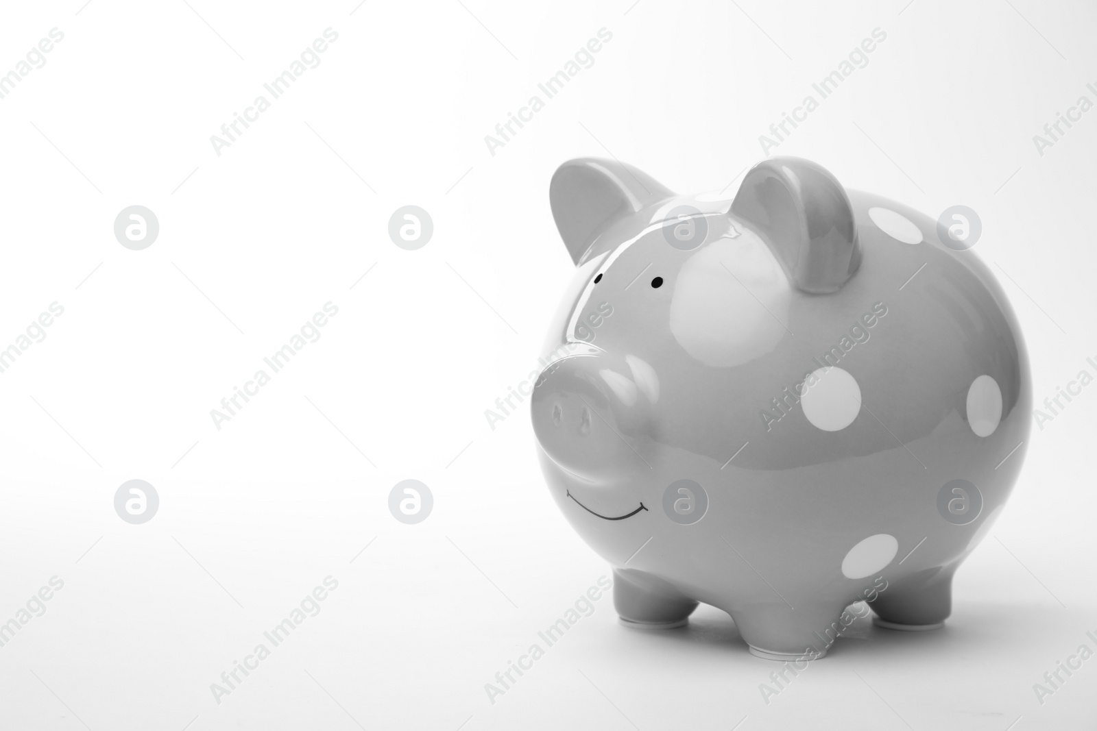 Photo of Cute piggy bank on white background. Money saving