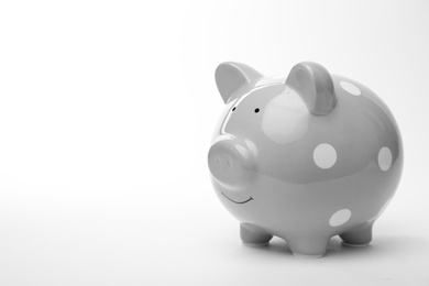 Cute piggy bank on white background. Money saving