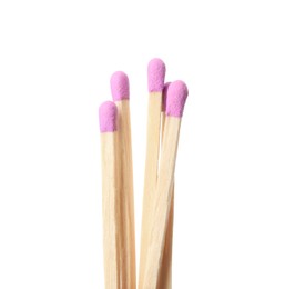 Photo of Matches with lilac heads on white background