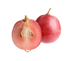 Photo of Natural grape seed essential oil dripping from berry on white background. Organic cosmetics