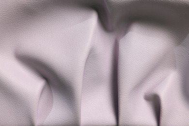 Photo of Beautiful violet leather as background, top view