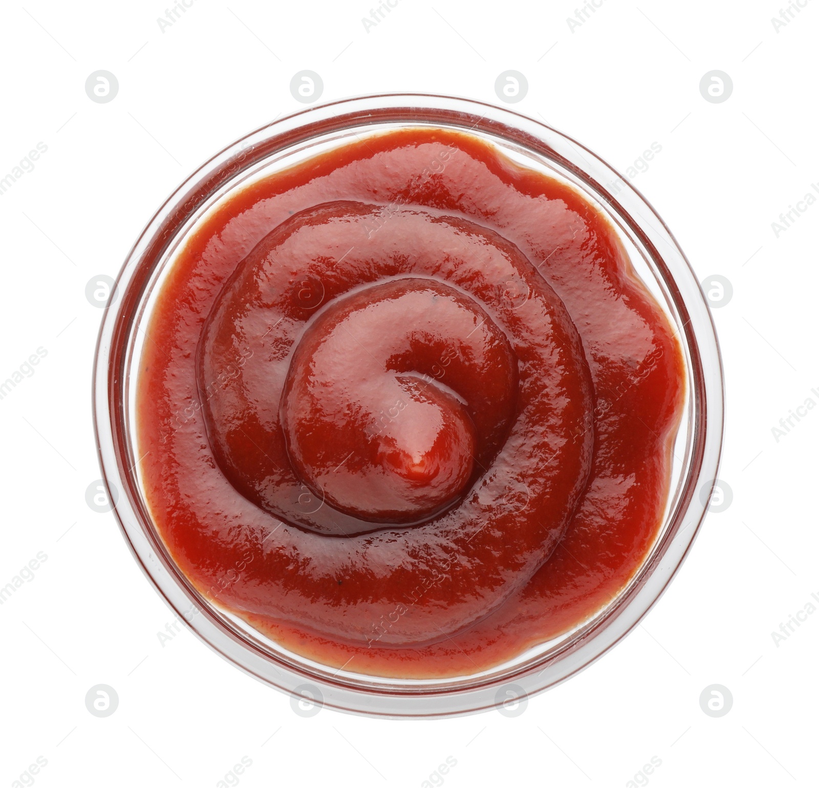 Photo of Tasty barbecue sauce in bowl isolated on white, top view