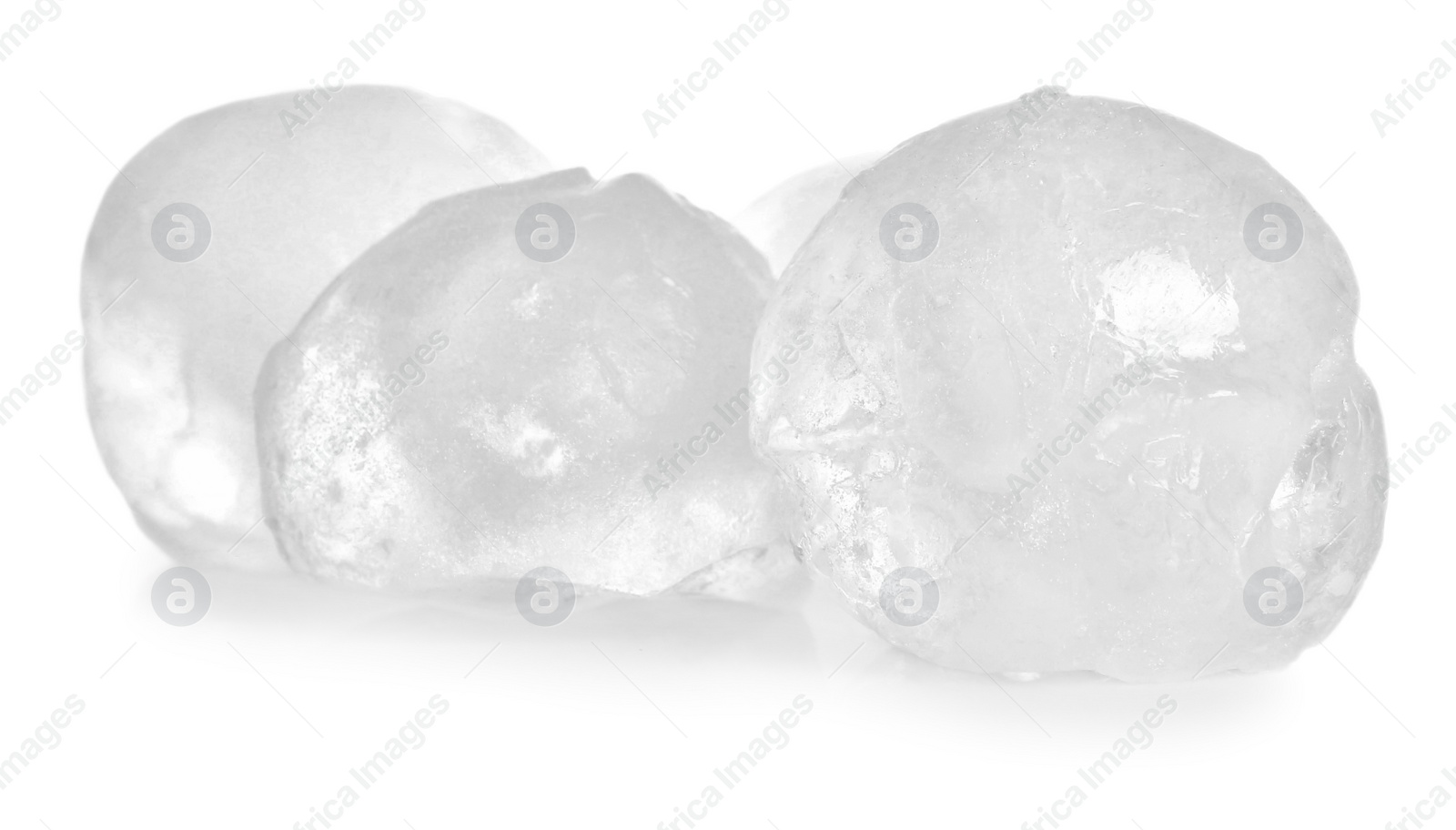 Photo of Many frozen ice balls on white background