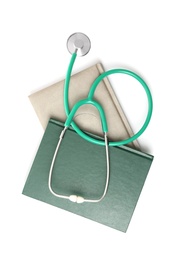 Student textbooks and stethoscope on white background, top view. Medical education