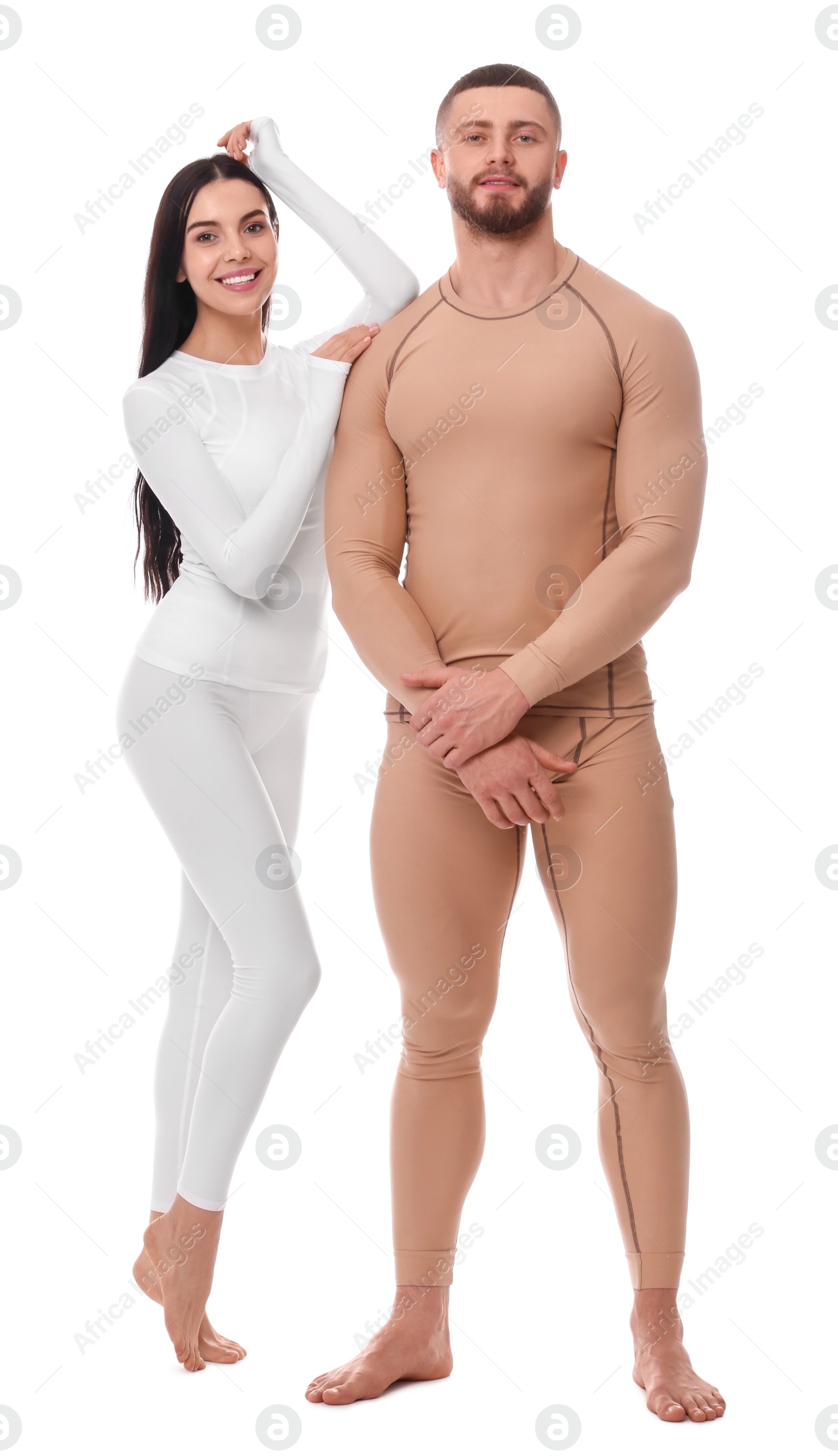 Photo of Man and woman in warm thermal underwear on white background