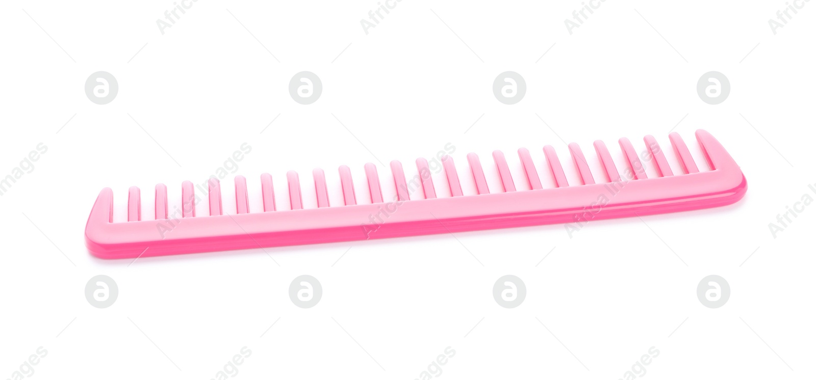 Photo of New pink hair comb isolated on white