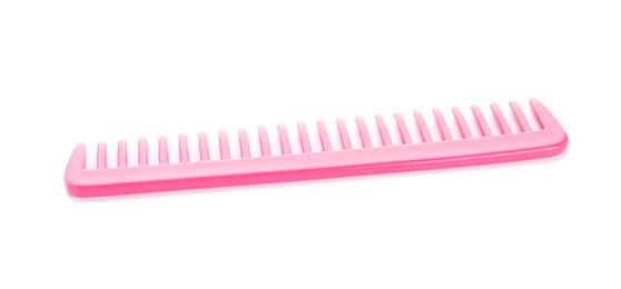 Photo of New pink hair comb isolated on white