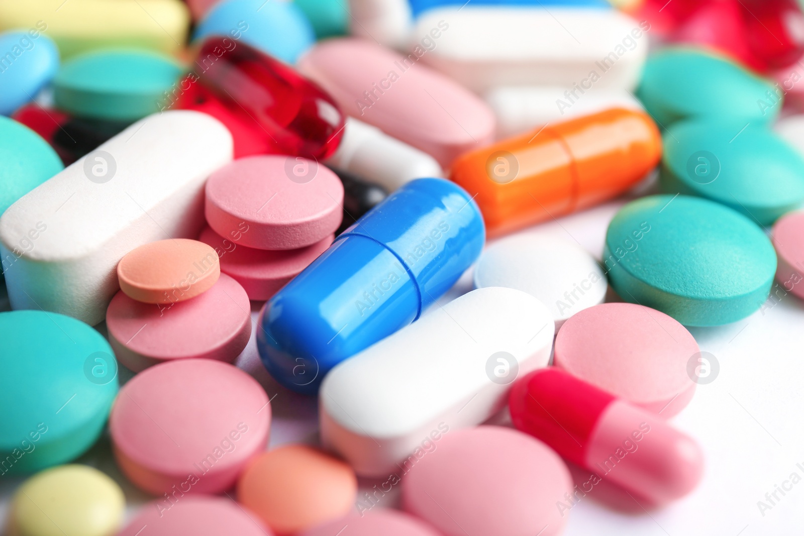 Photo of Many colorful pills as background