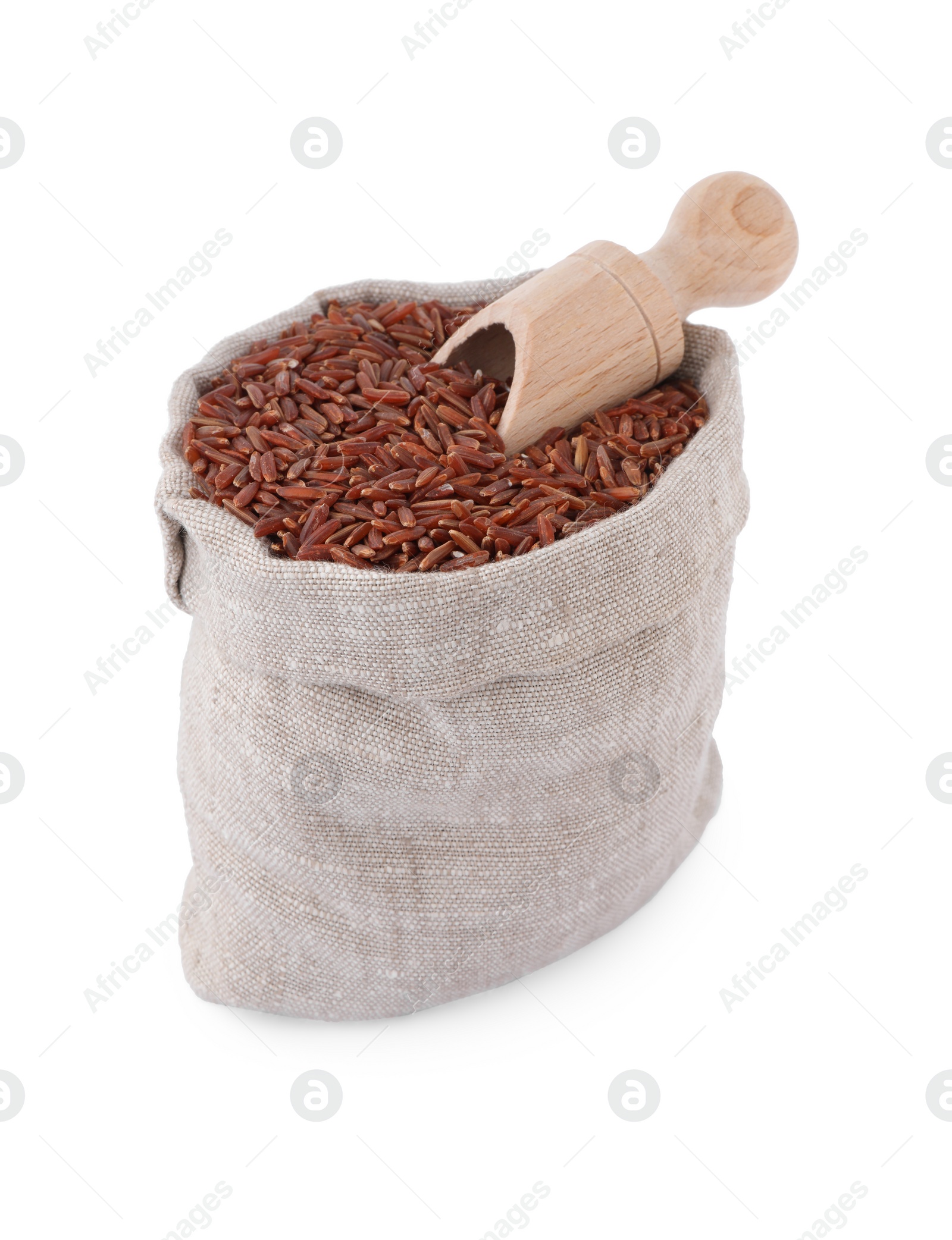 Photo of Raw red rice in sack isolated on white