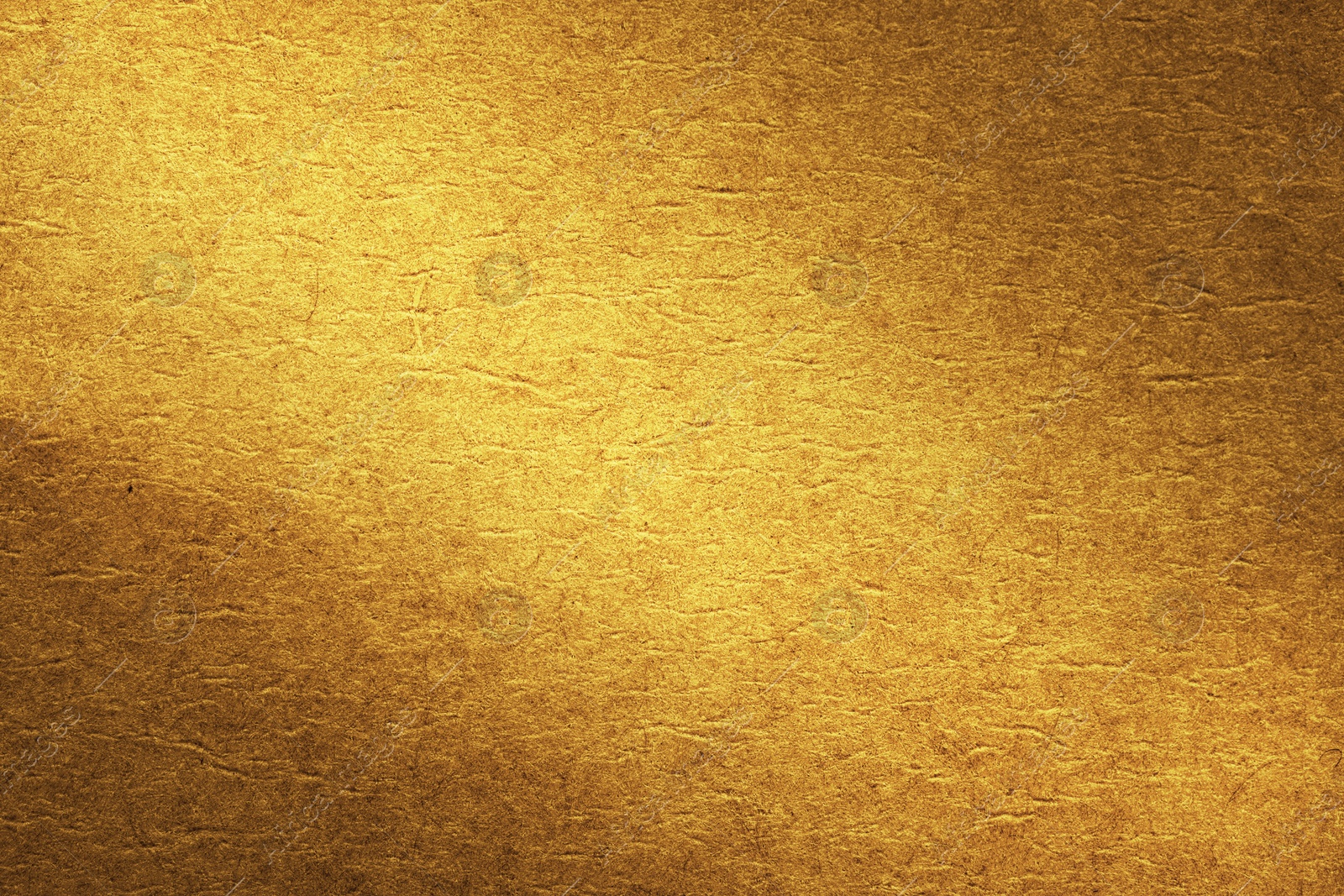 Image of Golden textured surface as background, closeup view