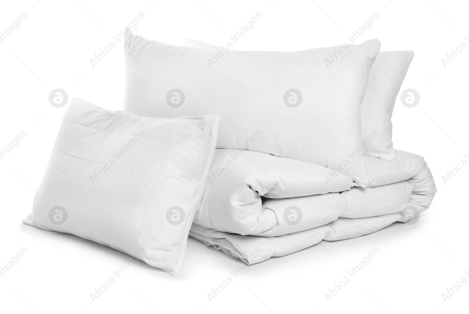 Photo of Clean blanket and pillows on white background