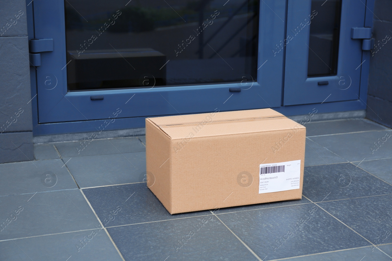 Photo of Parcel box on floor near office entrance