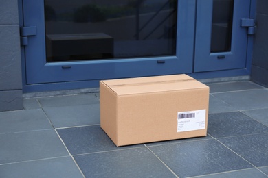 Photo of Parcel box on floor near office entrance