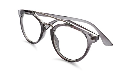 Photo of Glasses with corrective lenses on white background. Vision problem