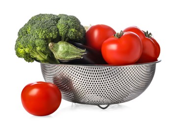 Photo of Colander with fresh vegetables isolated on white