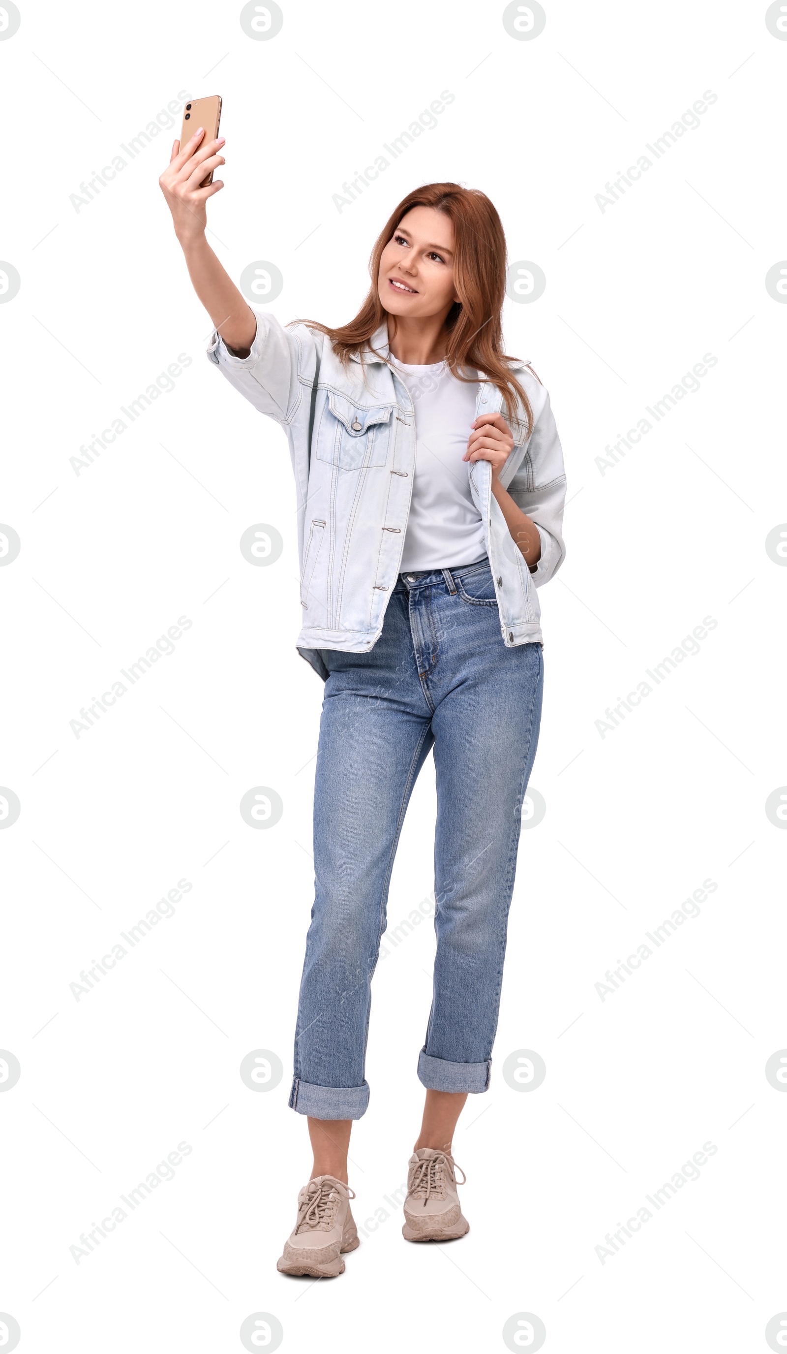 Photo of Beautiful woman taking selfie on white background