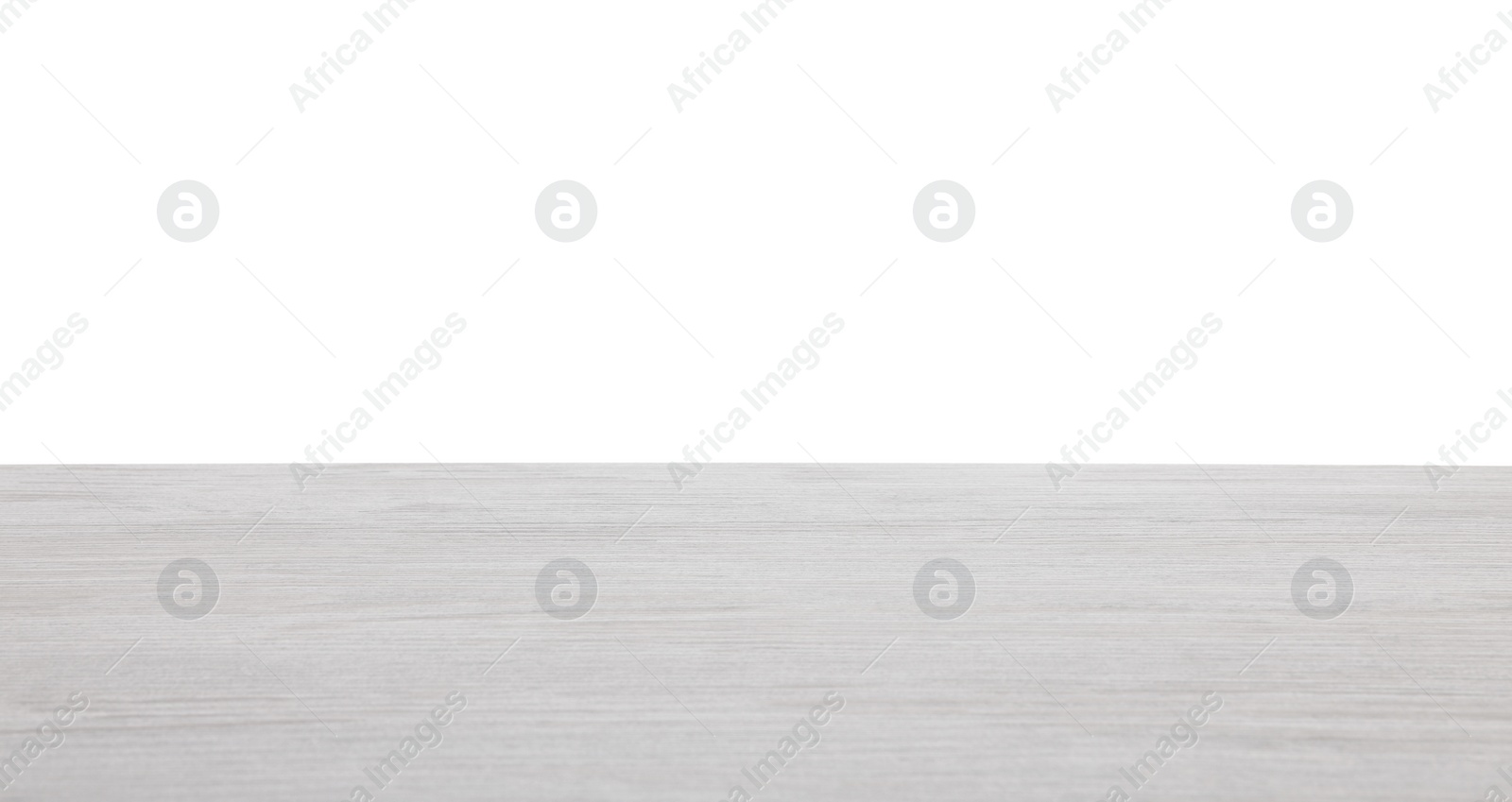 Photo of Empty light wooden table isolated on white