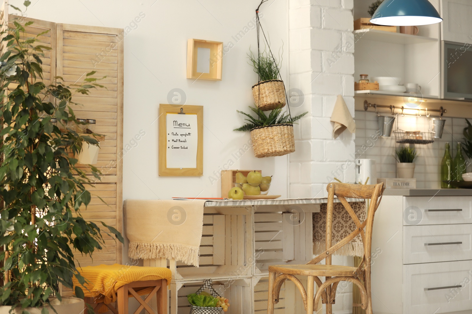 Photo of Modern kitchen interior with wooden crates as eco furniture