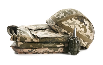 Military clothes and grenade on white background