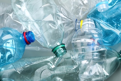 Photo of Many plastic bottles as background, closeup. Recycle concept