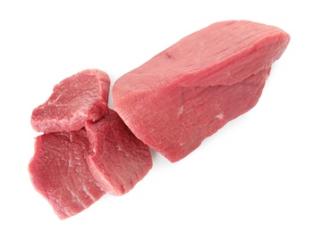 Cut raw meat on white background, top view