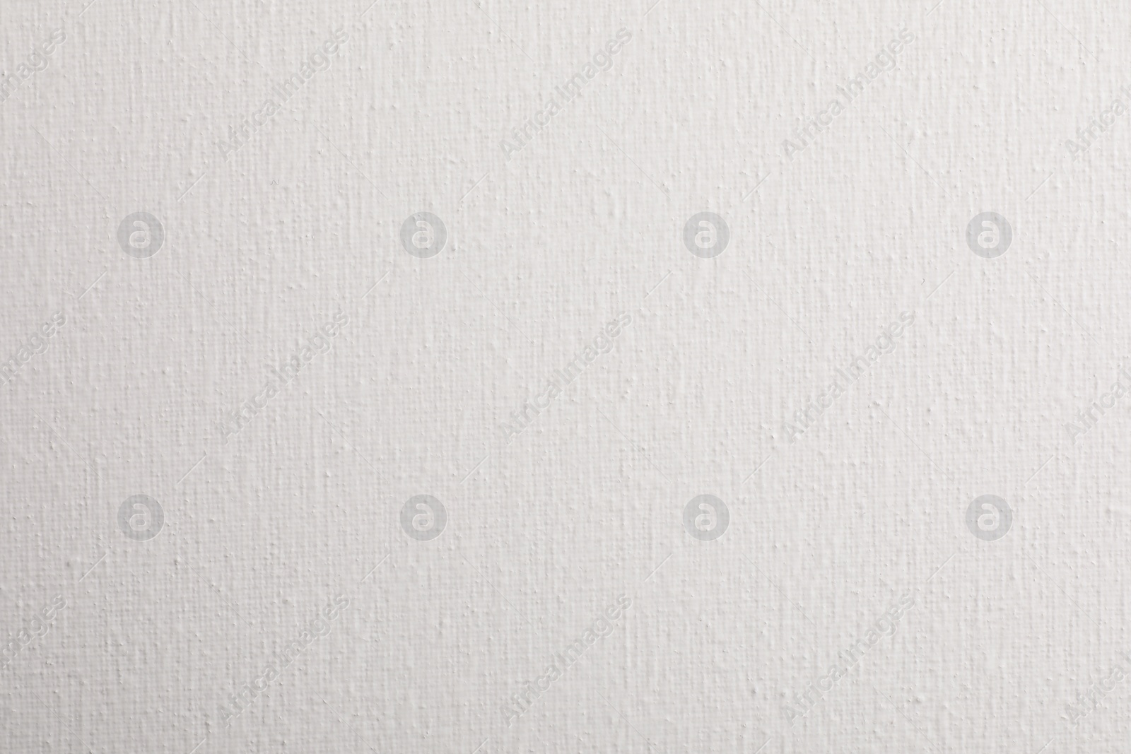 Photo of Blank white canvas as background, closeup view