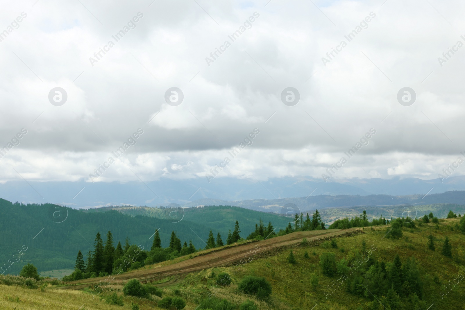 Photo of Picturesque view of mountain landscape and cloudy sky