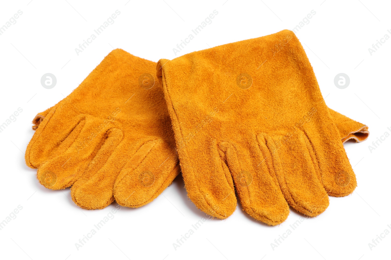 Photo of Orange protective gloves on white background. Safety equipment