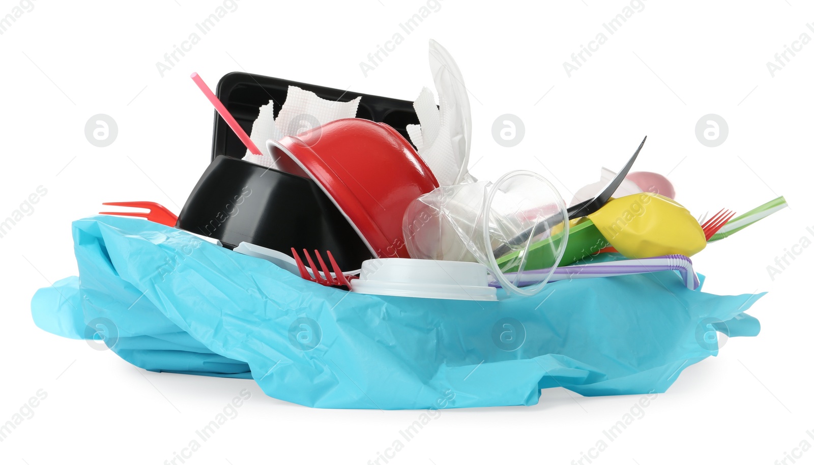 Photo of Pile of different plastic items on white background