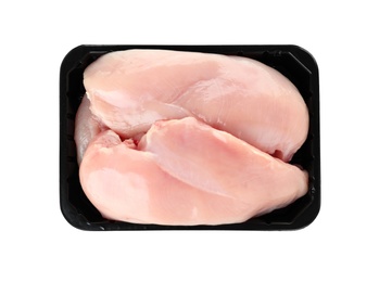 Photo of Container with raw chicken breasts on white background, top view. Fresh meat
