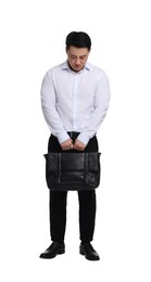 Tired businessman with briefcase posing on white background