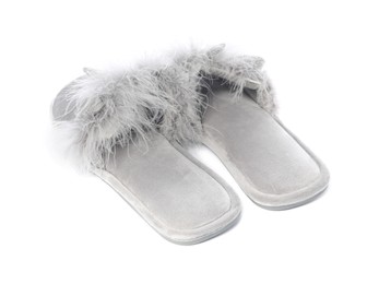 Photo of Pair of soft slippers with fur isolated on white