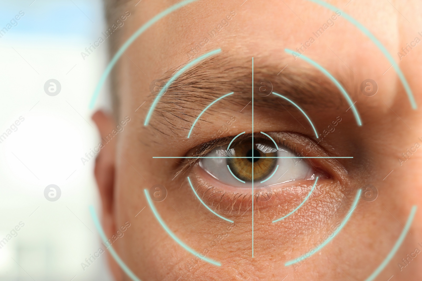 Image of Closeup view of man and mark illustration on his eye. Vision correction surgery