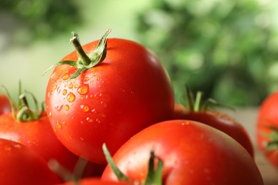 Photo of Pile of fresh ripe tomatoes, closeup view