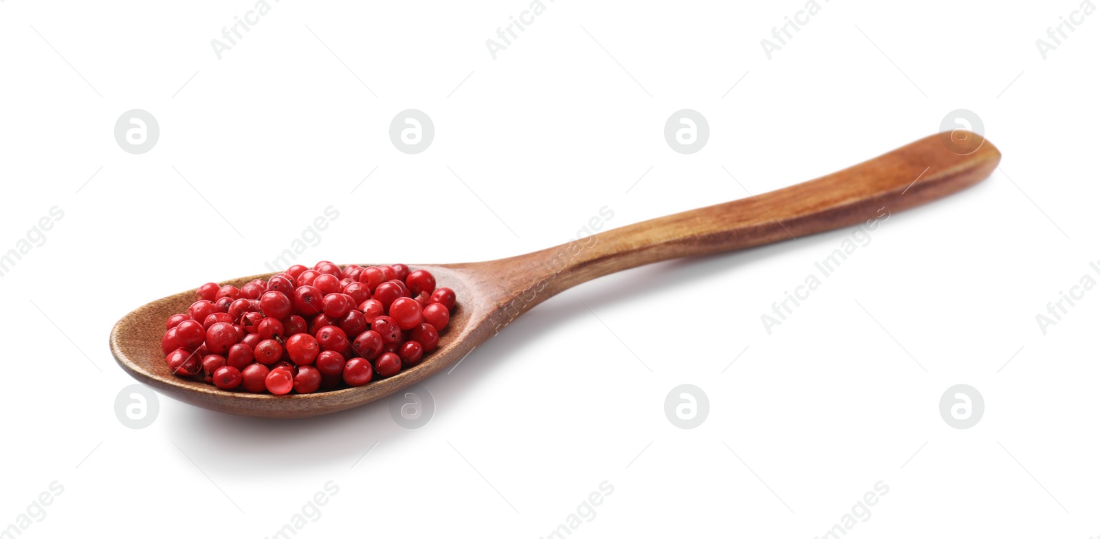 Photo of Aromatic spice. Red pepper in spoon isolated on white