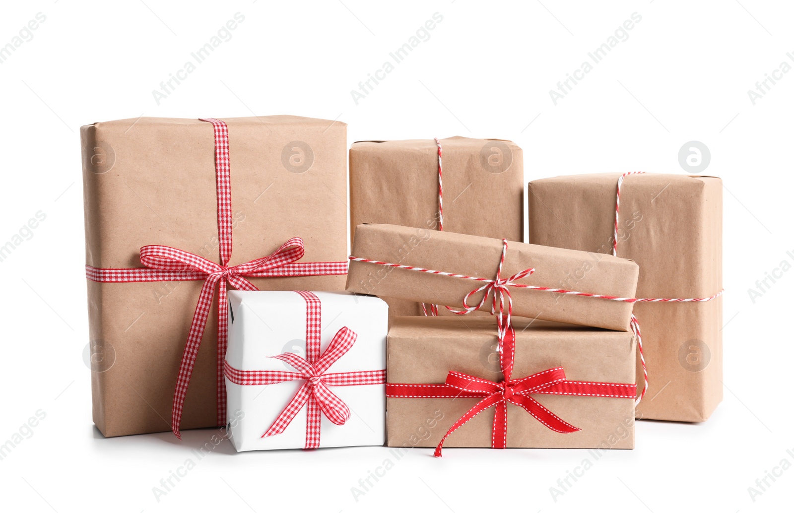 Photo of Beautifully wrapped gift boxes on white background