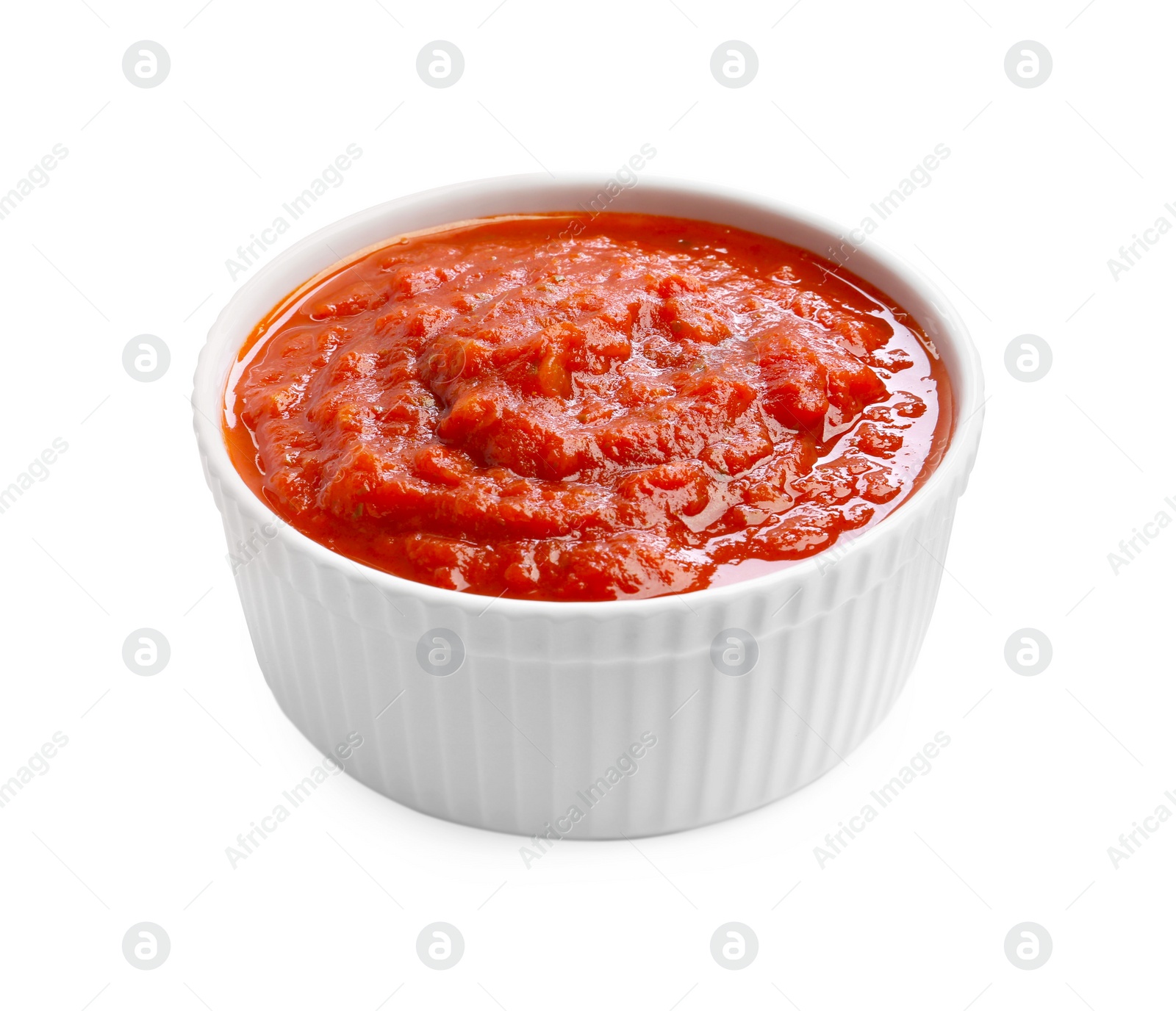 Photo of Homemade tomato sauce in bowl isolated on white