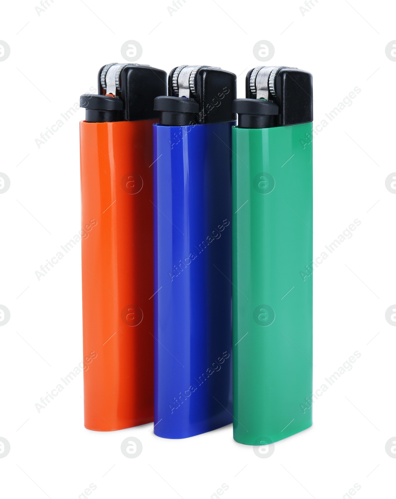 Photo of Stylish small pocket lighters on white background