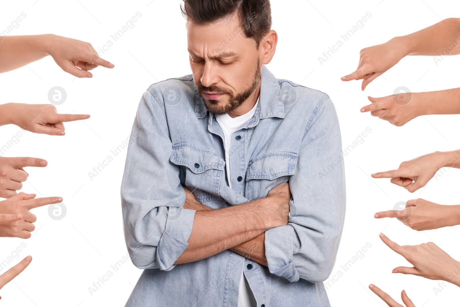 Photo of People bullying upset man on white background