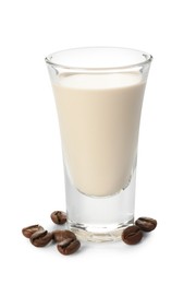 Glass of coffee cream liqueur and beans isolated on white