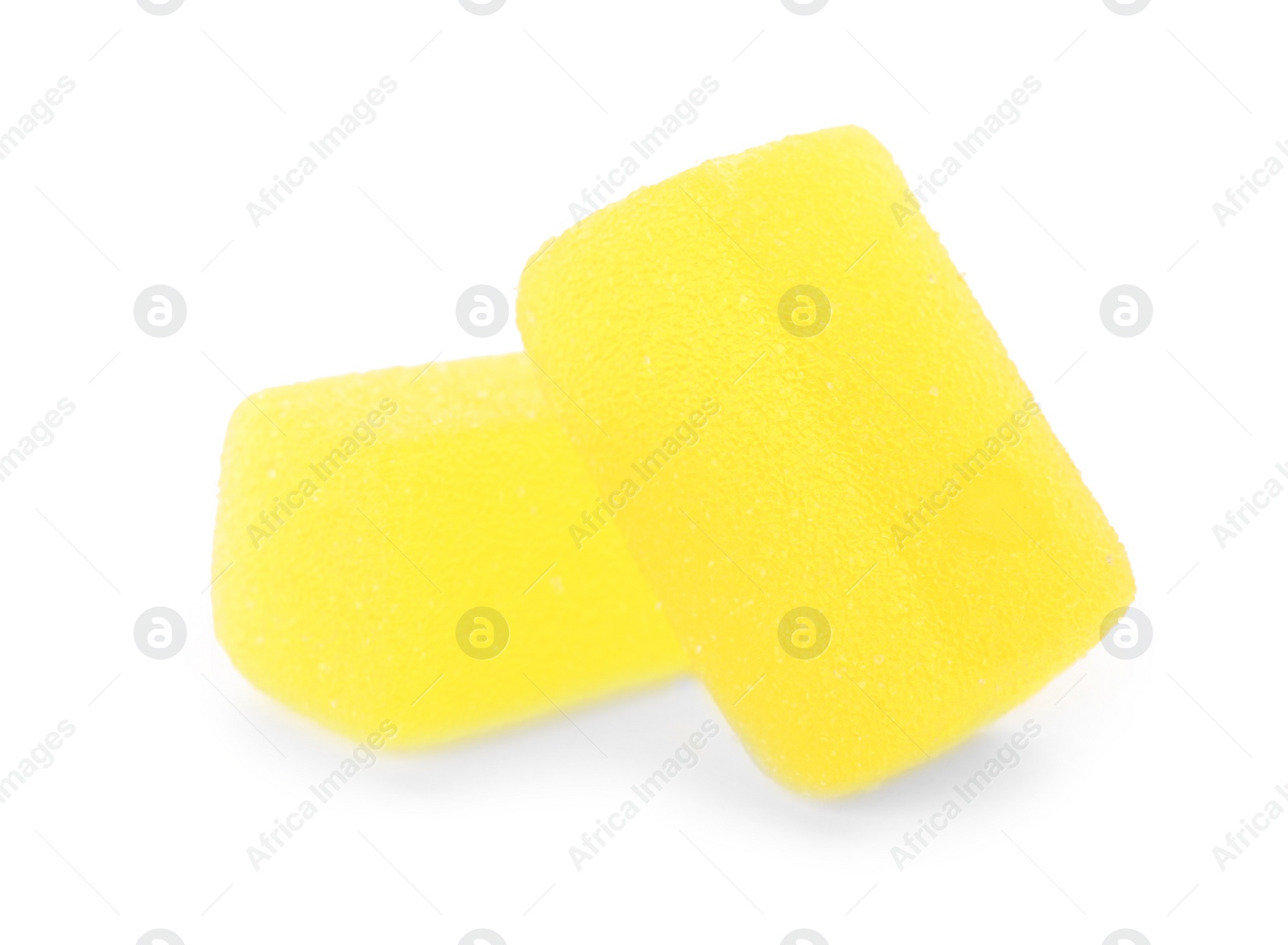 Photo of Bright delicious jelly candies on white background