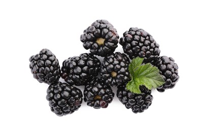 Photo of Tasty ripe blackberries and leaf on white background, top view