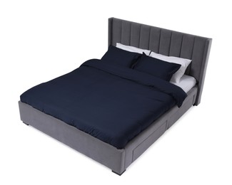 Photo of Comfortable gray bed with dark blue linens on white background