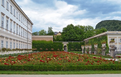 SALZBURG, AUSTRIA - JUNE 22, 2018: Beautiful Mirabell garden with blooming flowers