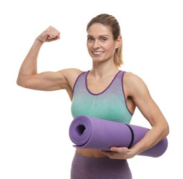Photo of Portraitsportswoman with fitness mat showing muscles on white background
