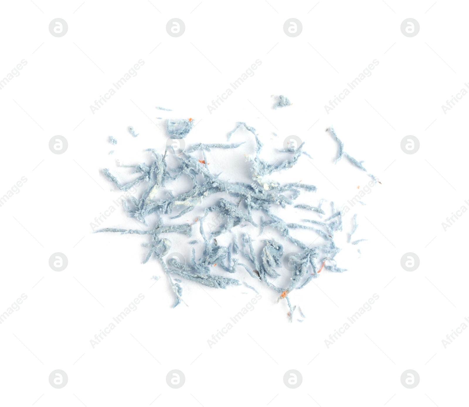 Photo of Pile of light blue eraser crumbs on white background, top view