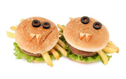 Photo of Tasty monster sandwiches for Halloween party isolated on white
