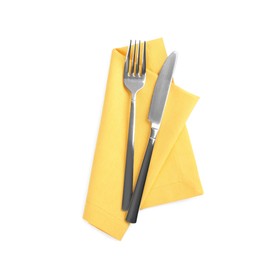Photo of Yellow napkin with fork and knife on white background, top view