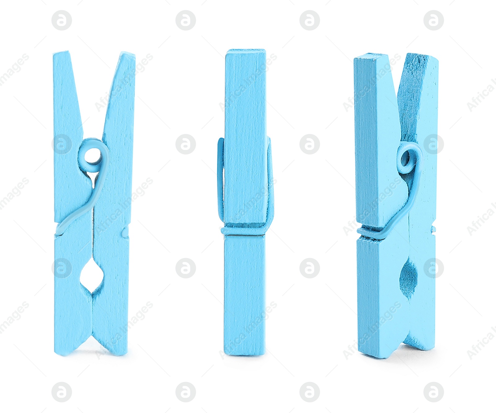 Image of Set with blue wooden clothespins on white background