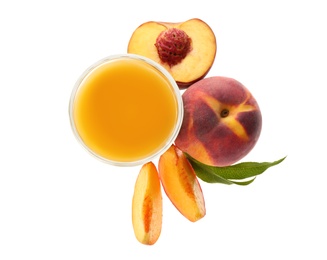 Freshly made tasty peach juice on white background, top view